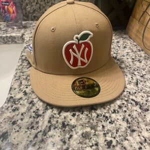 New Era Tan Cap with Red Apple Logo